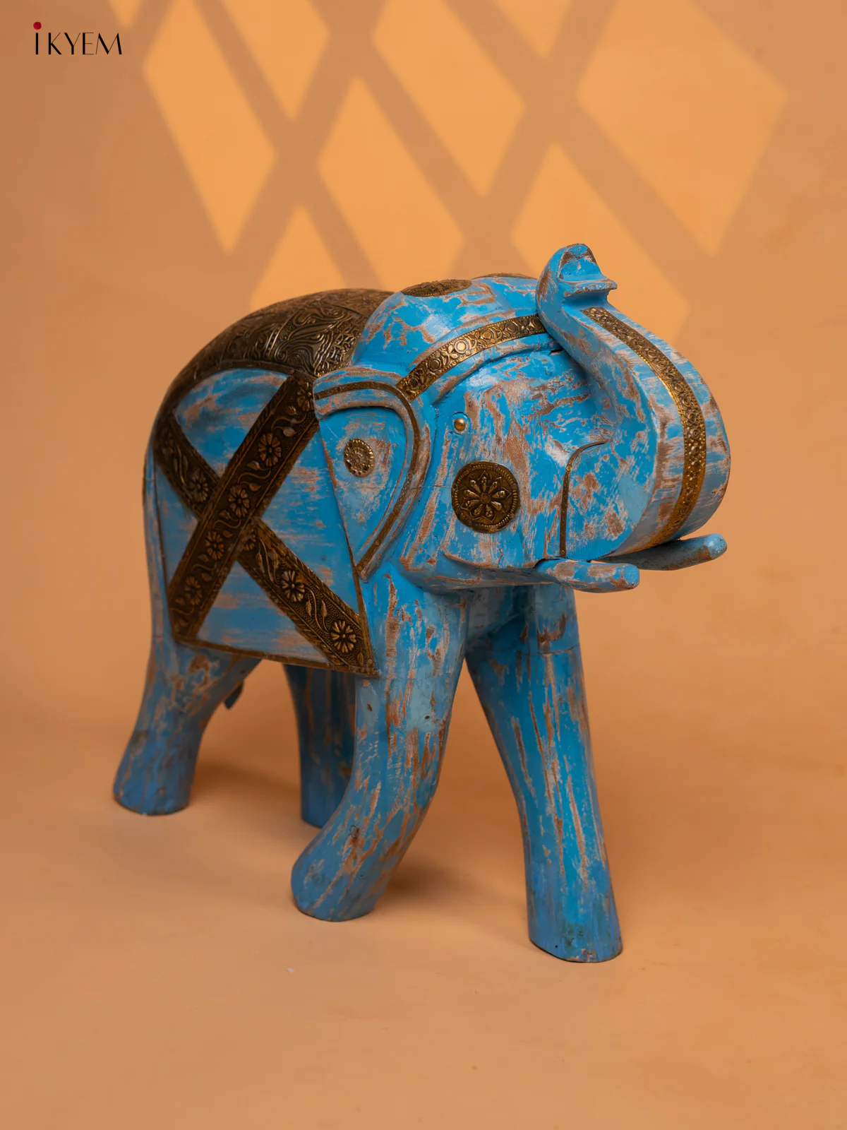 UPWARD TRUNK WOOD ELEPHANT WITH BRASS LADEN
