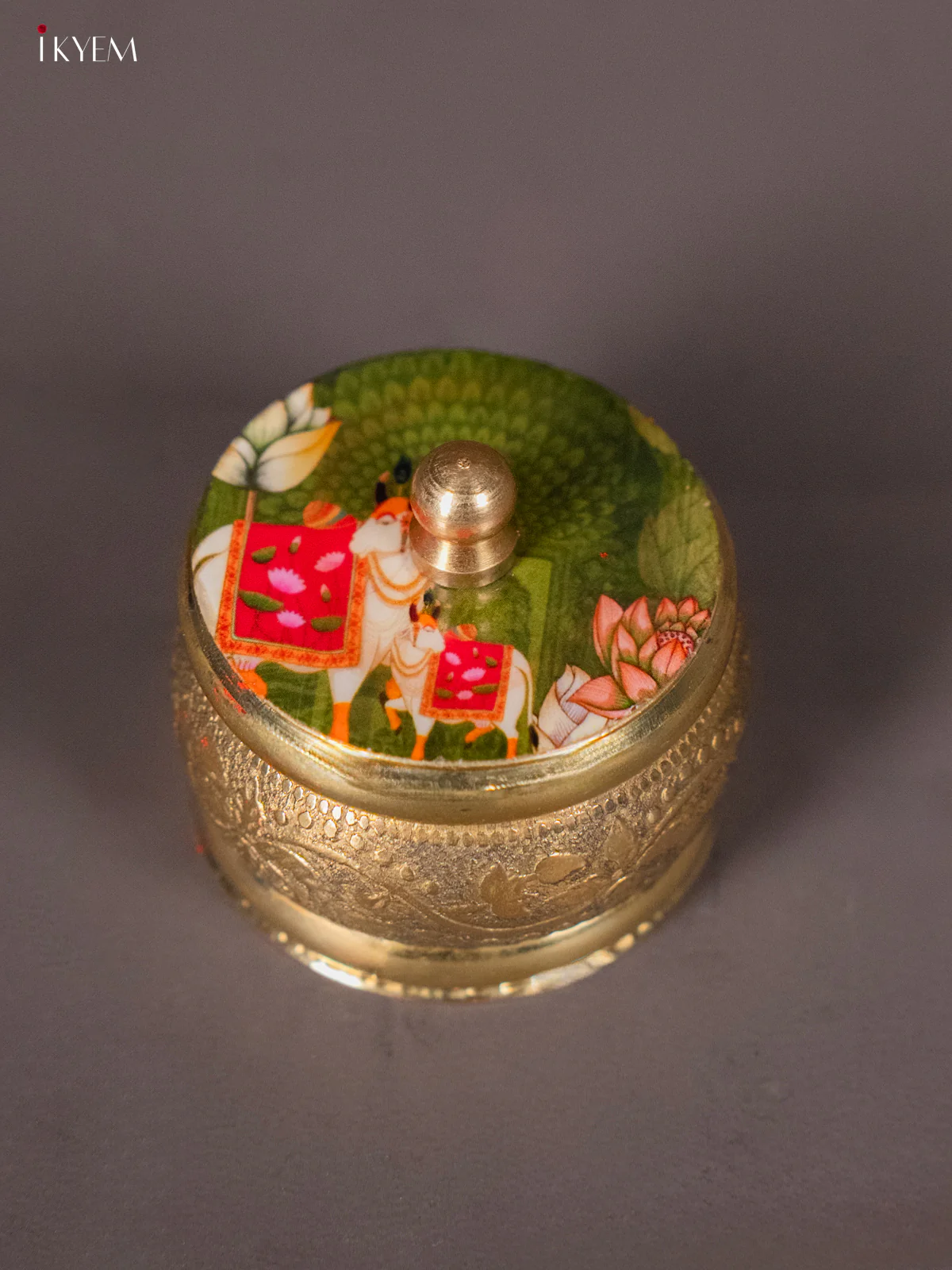 Serene Brass coated Kumkum Holder With Green Pichwai Cow & Calf Printed Lid