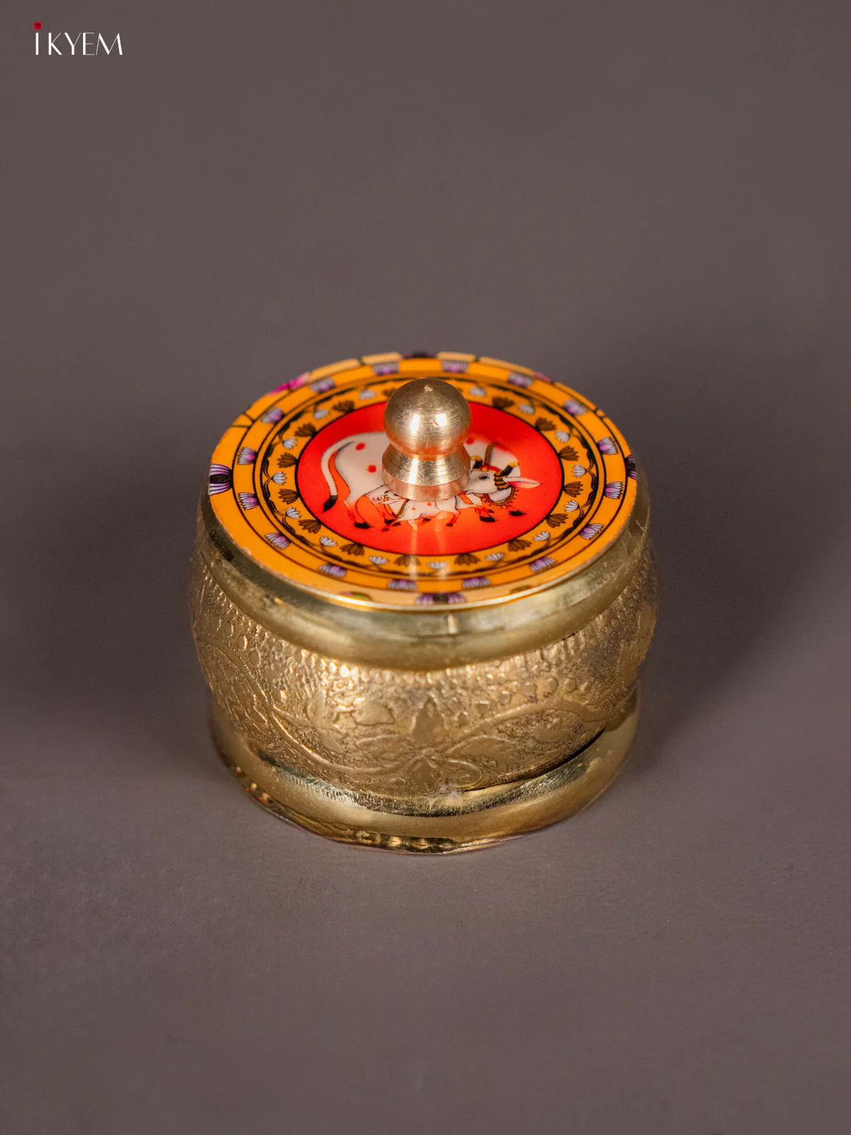Brass coated Kumkum Holder With Yellow & Orange Pichwai Cow & Calf Printed Lid - KI01213