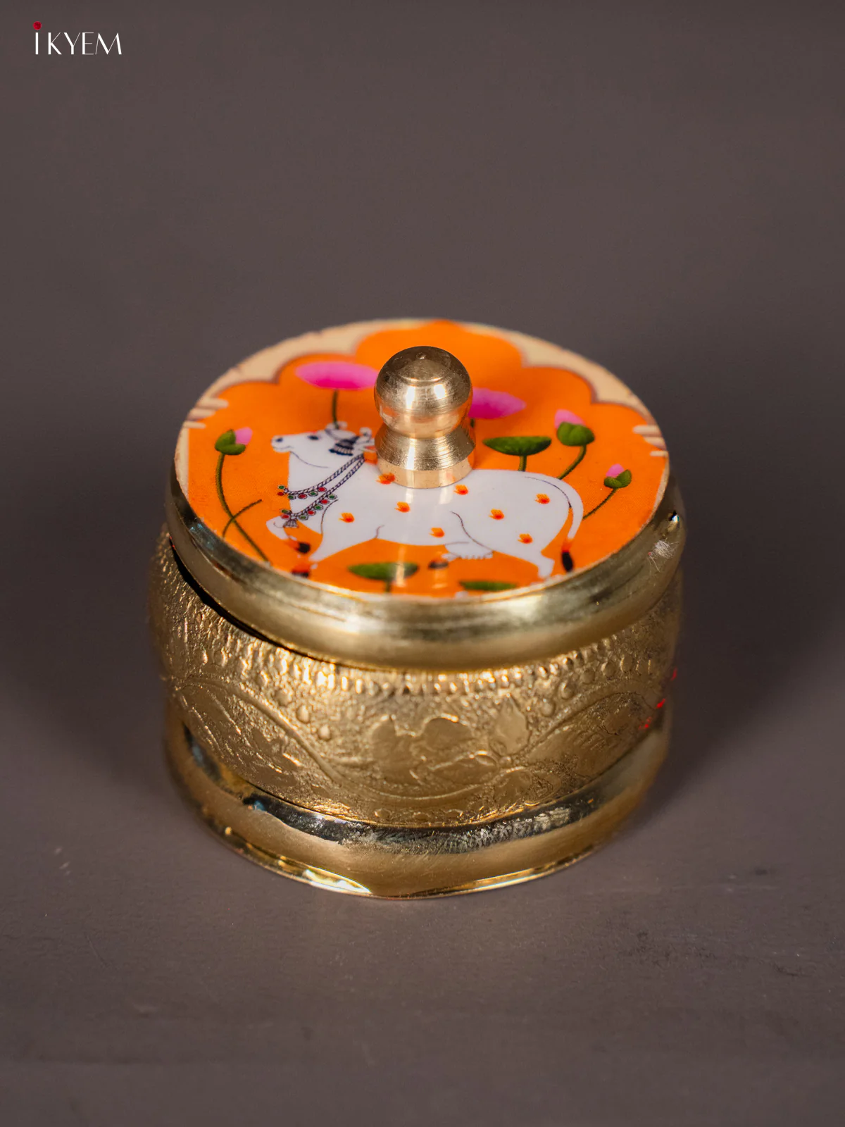 Regal Brass coated Kumkum Holder With Yellow Color Pichwai Printed Lid - KI01209