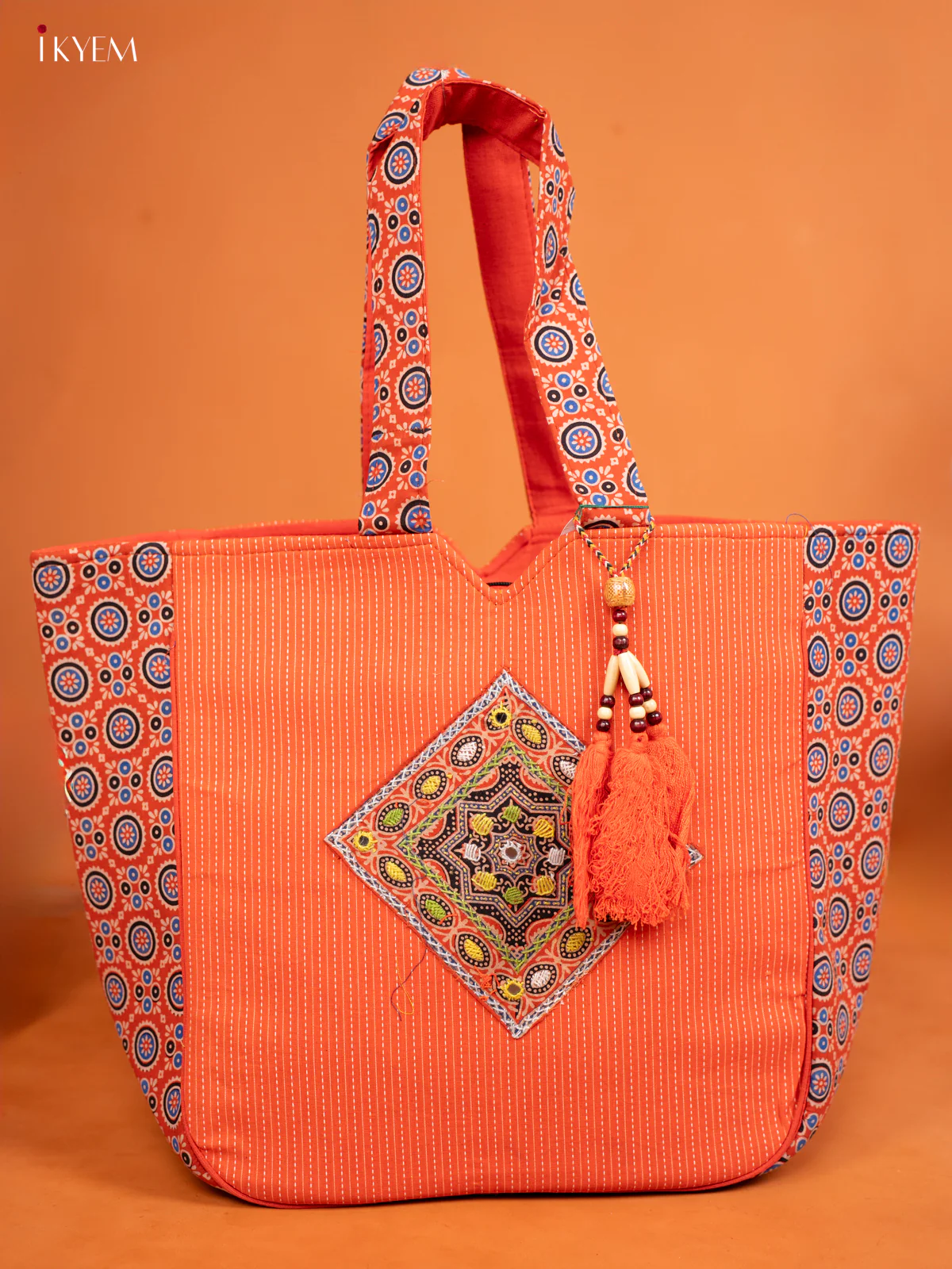 Ajrakh Aari work Hand bag - Orange