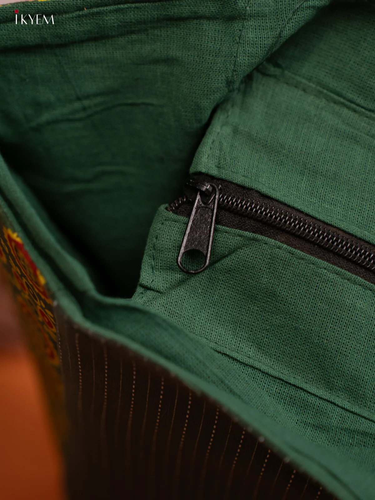 Ajrakh Aari work Hand bag - Green - Image 3